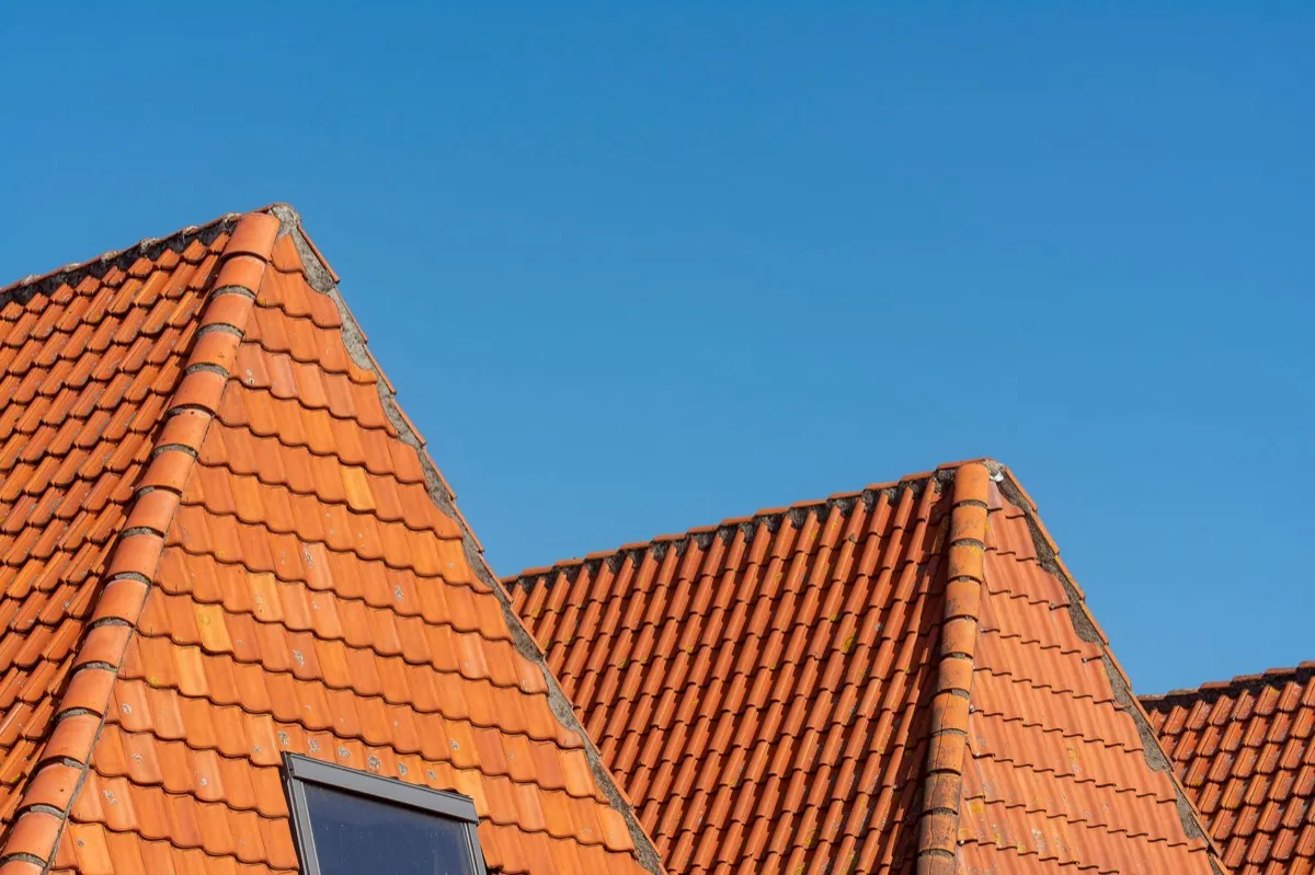 Clay barrel tile rooflines on homes in Beaumont, TX
